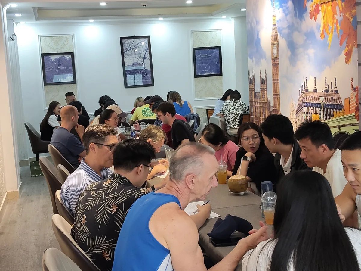 A language exchange gathering inside ME Cafe at 244A Pasteur.