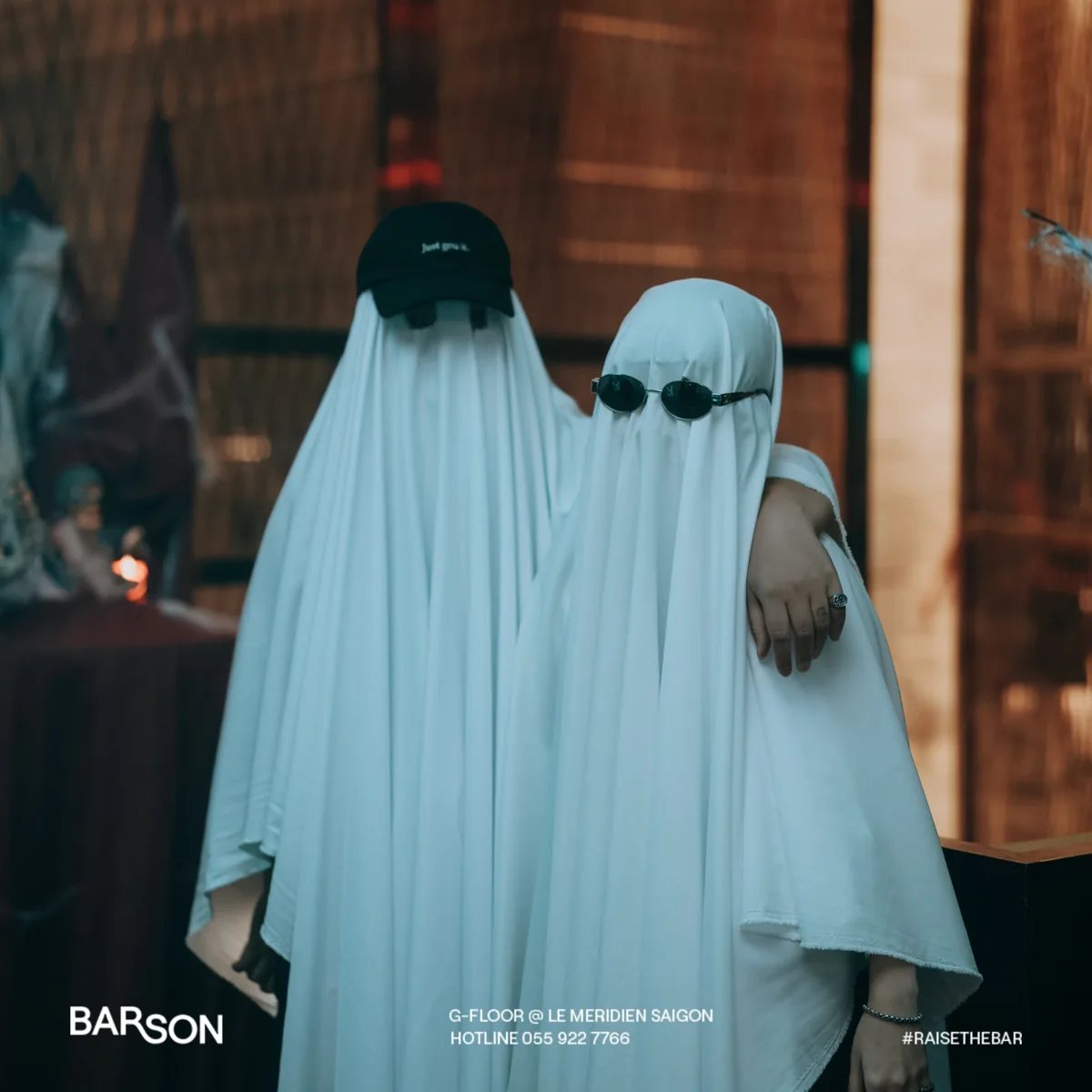 Two guests in ghost costumes in BAR SON’s Halloween promotion at Le Méridien Saigon.