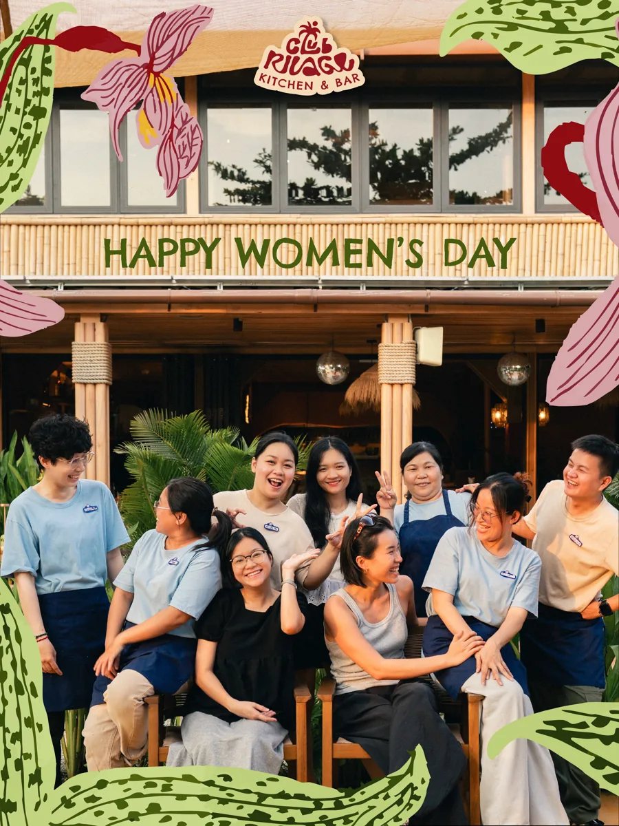 Club Rivage team photo with the sign 'Happy Women's Day' on the venue front, from the organizer's Women's Day post.