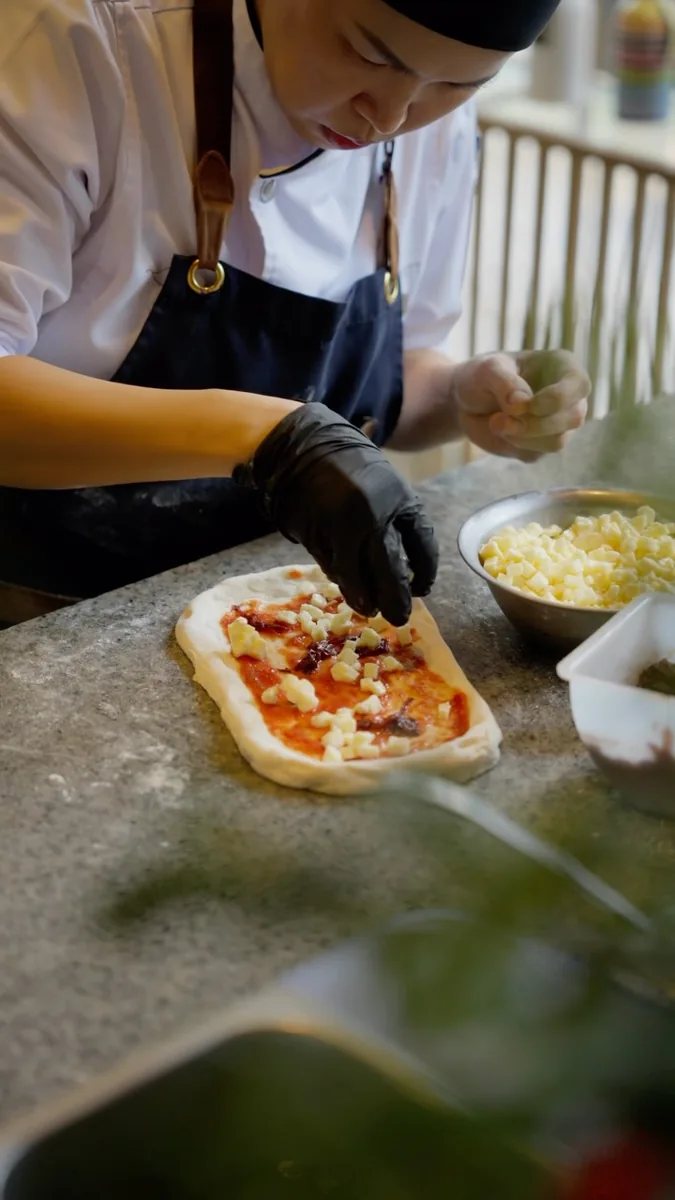 A Basilico chef preparing Italian food for Sunday Brunch