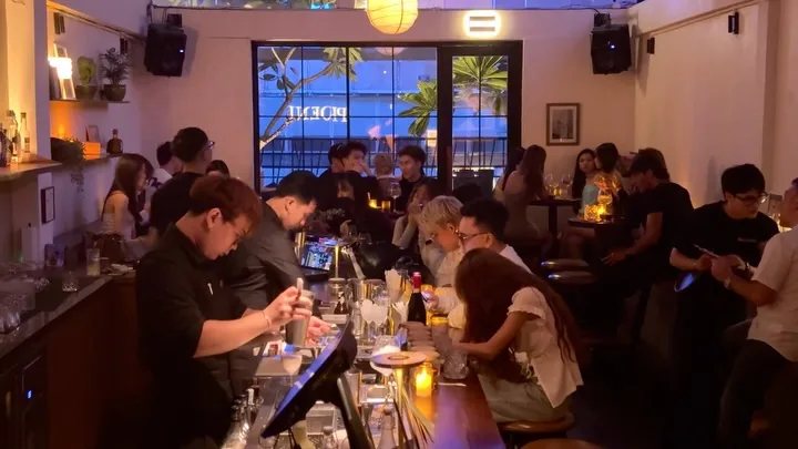 Guests seated at the Before Hours bar during its recurring ladies night