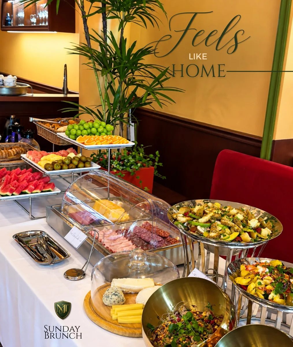 Maison Tony Sunday brunch buffet with fruit, cheese and salads