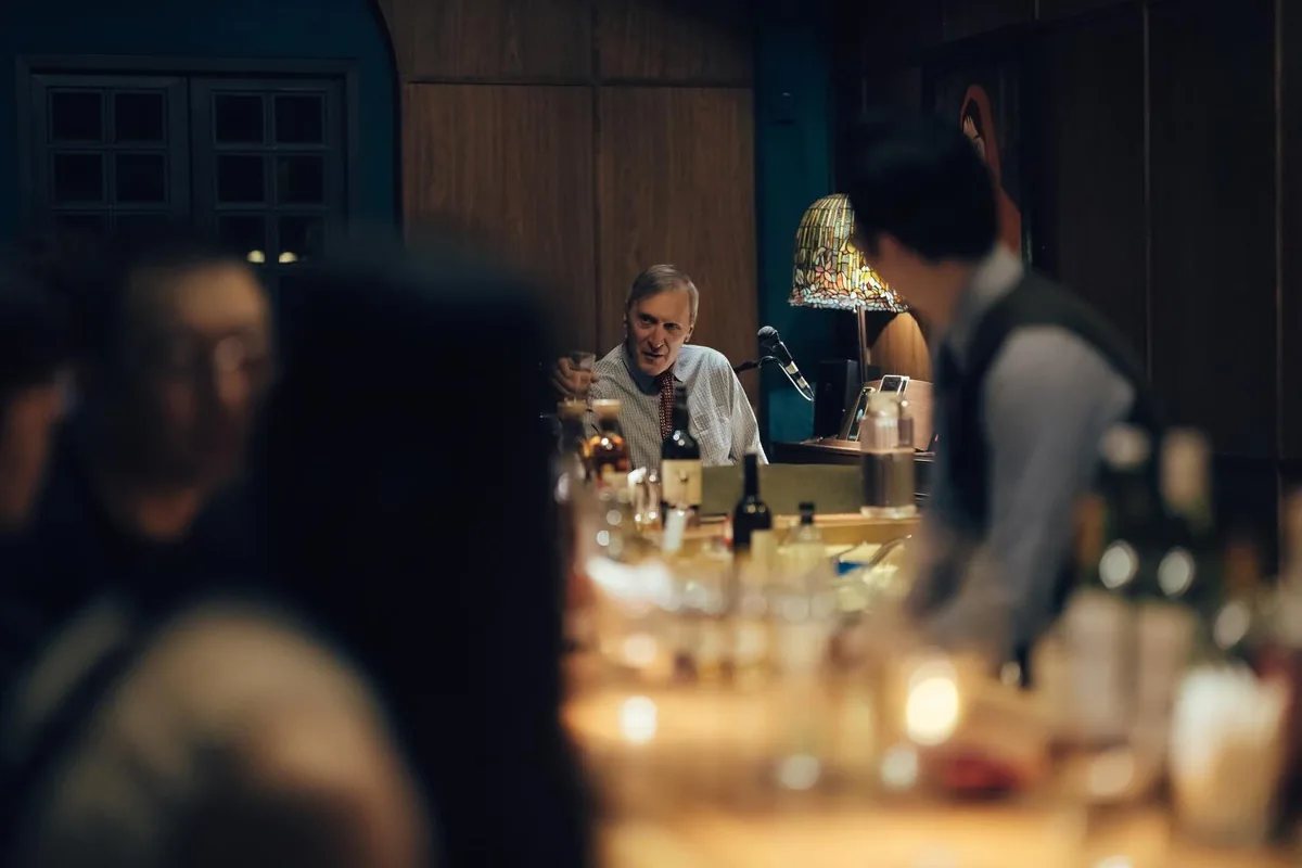 Wood-paneled Angels’ Share whisky bar interior at 178/L1 Pasteur