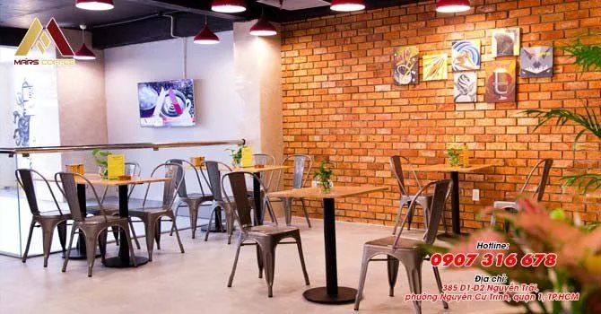 Date-neutral interior of Mars Coffee at 385 D1–D2 Nguyễn Trãi, District 1, showing its café tables and seating; illustrative venue photo for the October 29 language exchange.