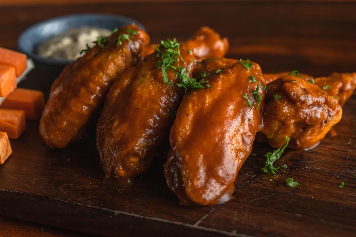 Malt Saigon chicken wings pictured in its Wing Wednesday promotion; 50 percent off every Wednesday.