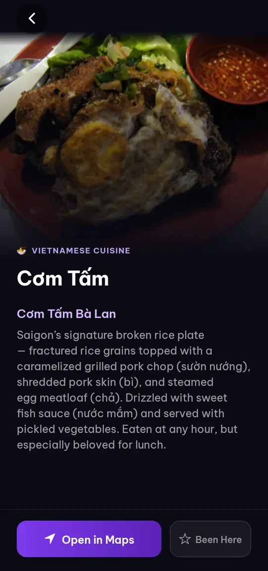 A city guide entry for cơm tấm with an Open in Maps button
